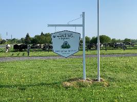 Farm sign with Maple Hill logo_thumb